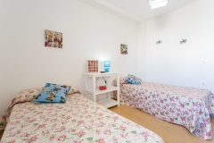 dormitorio-dos-camas-blanco